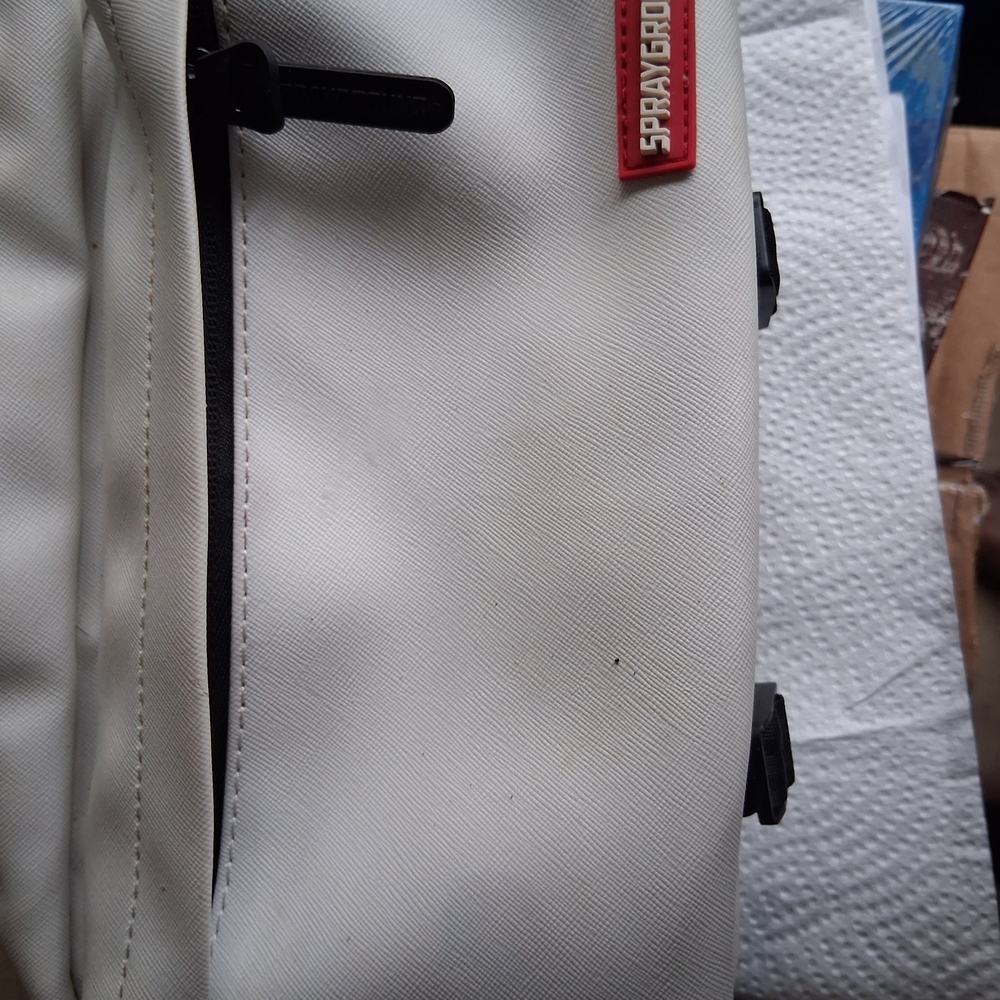 Sprayground White Crossbody Bag with Red Logo Accent